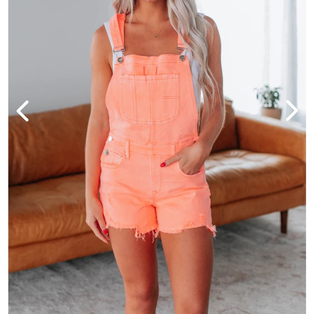 Orange Jumpsuit with Adjustable Straps and Distressed Hem